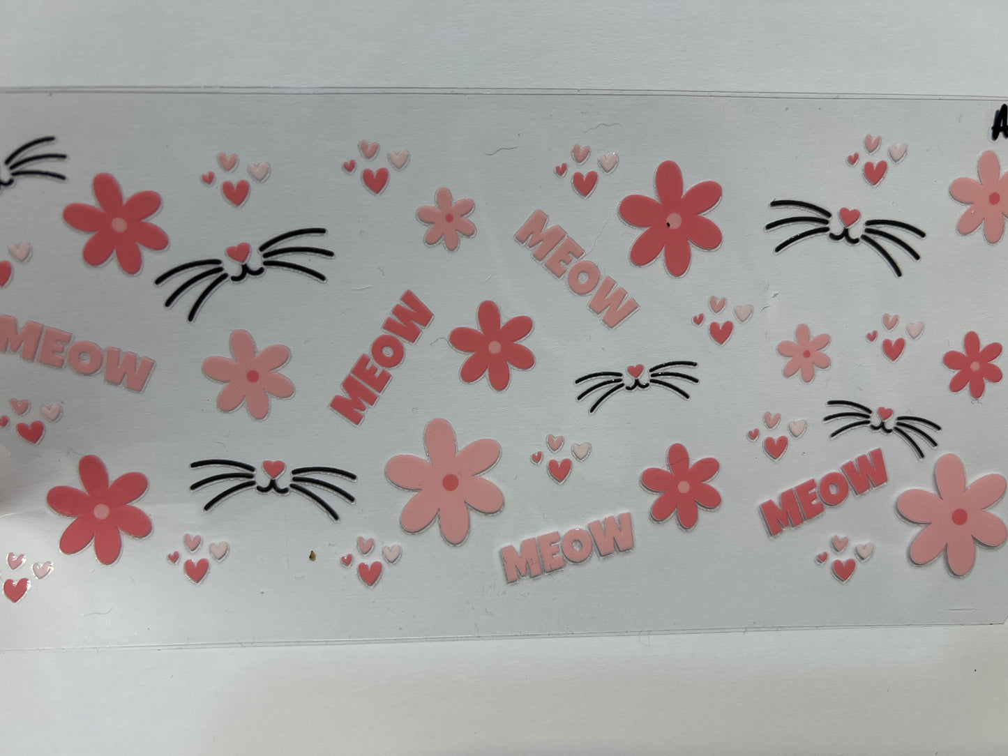 A22 cat whiskers and pink flowers